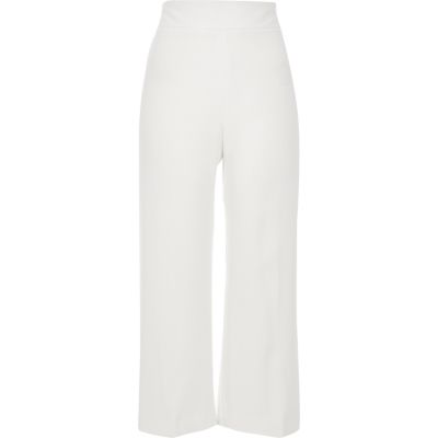 White cropped wide leg trousers